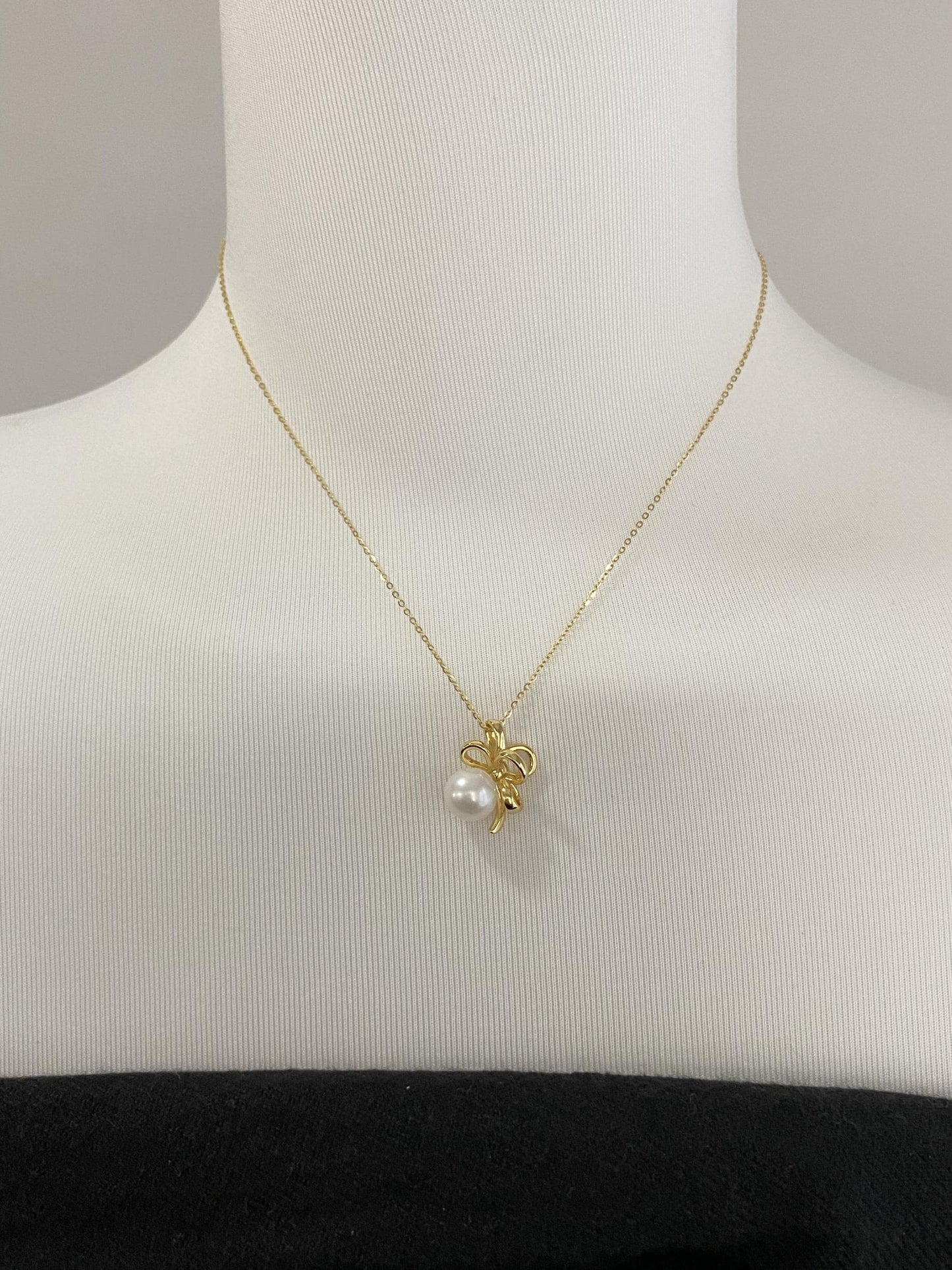 Sterling Silver Pearl Bow Necklace