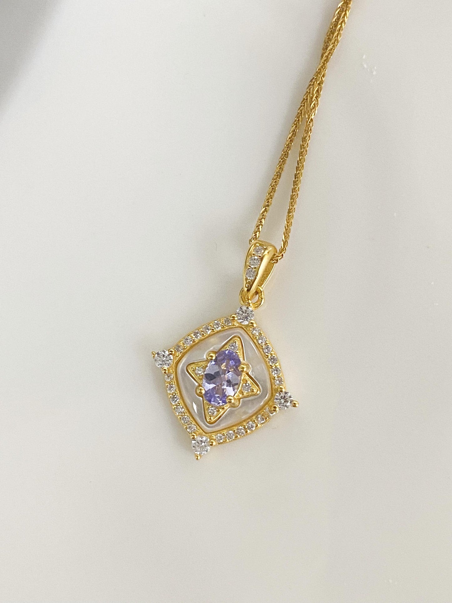 Tanzanite Pendant Necklace with Zircon Halo