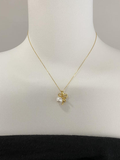 Sterling Silver Pearl Bow Necklace