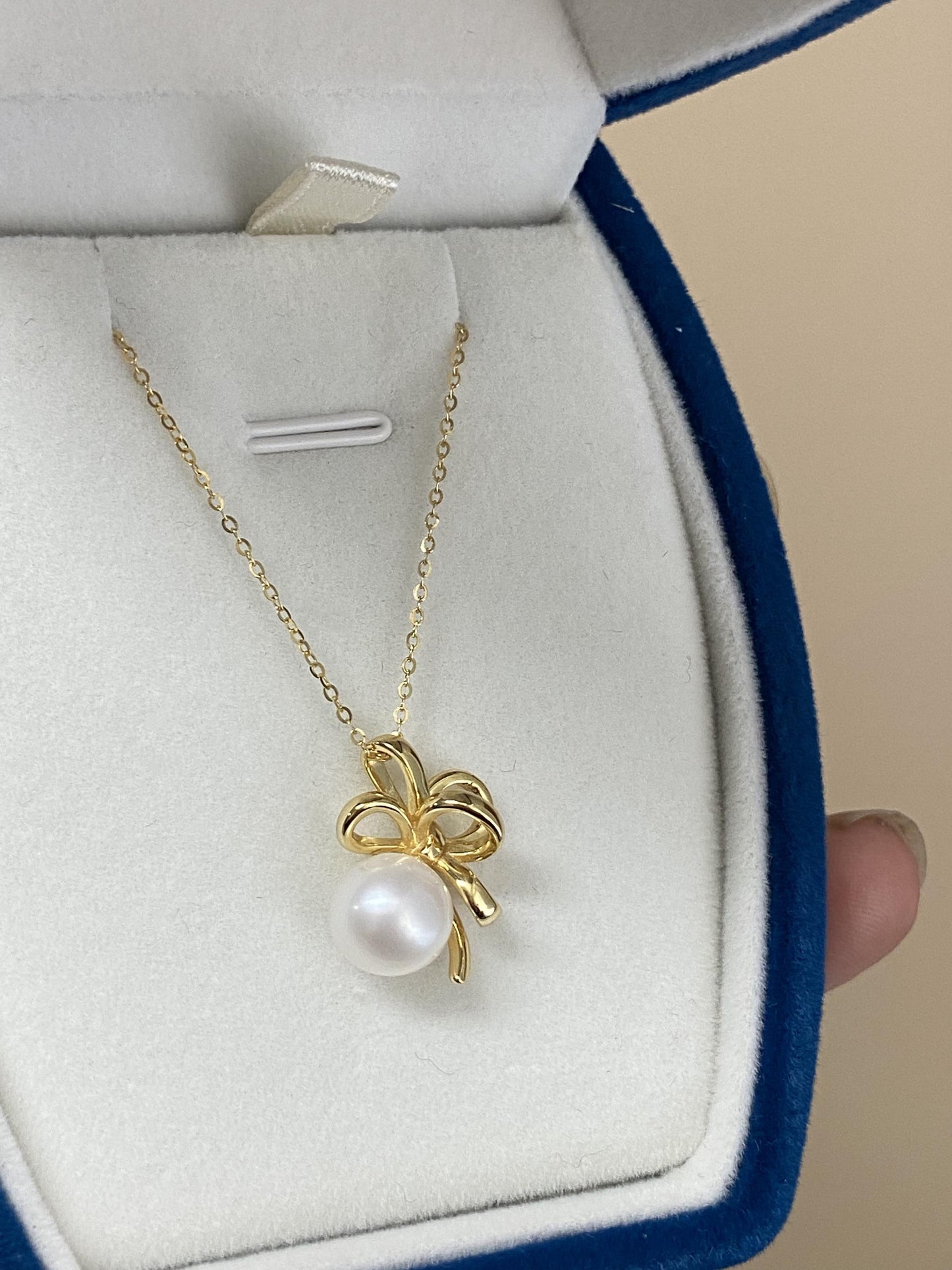 Sterling Silver Pearl Bow Necklace