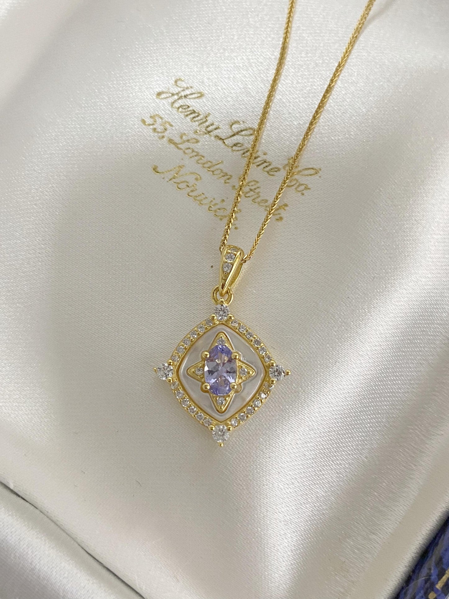 Tanzanite Pendant Necklace with Zircon Halo
