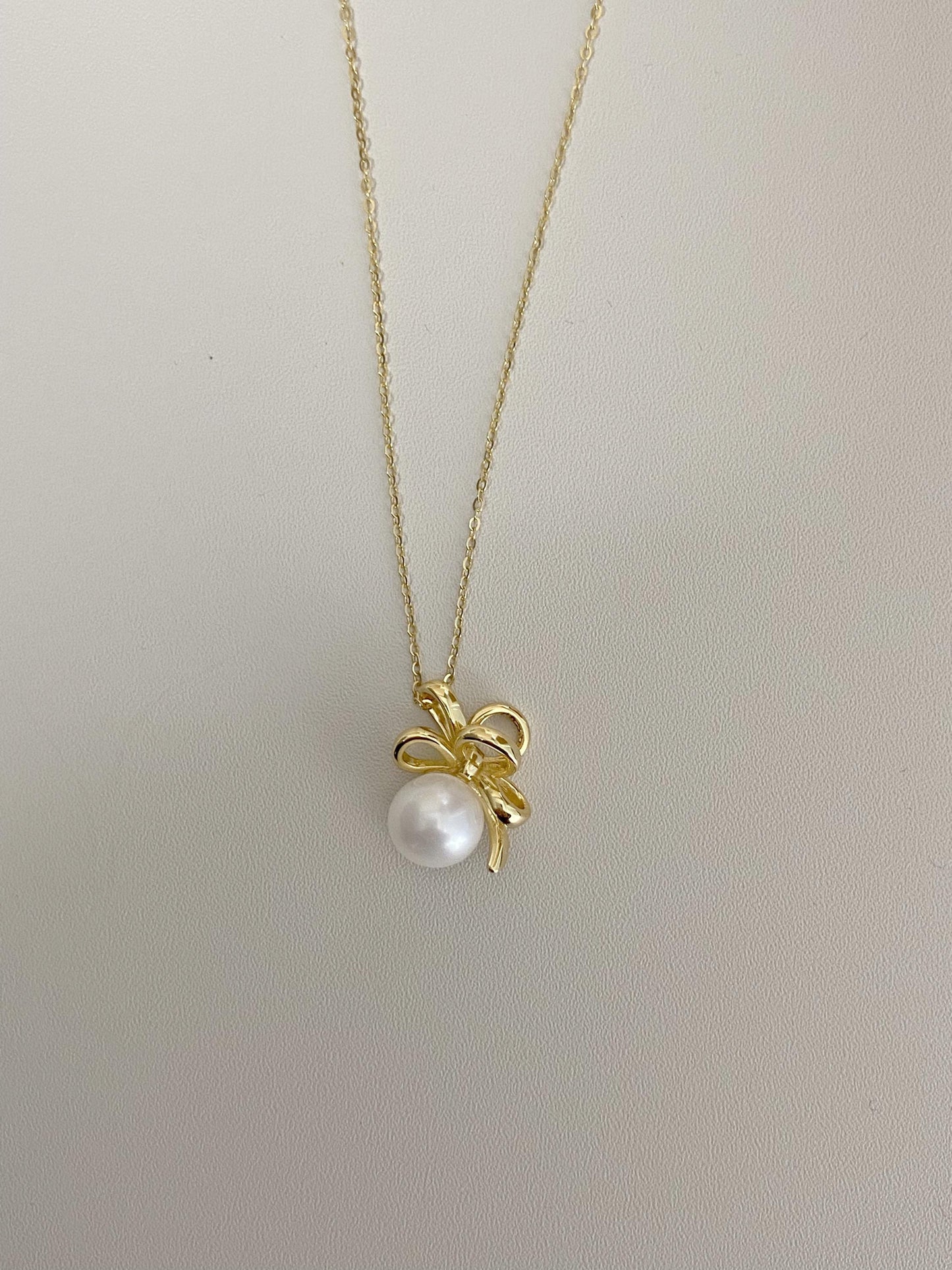 Sterling Silver Pearl Bow Necklace