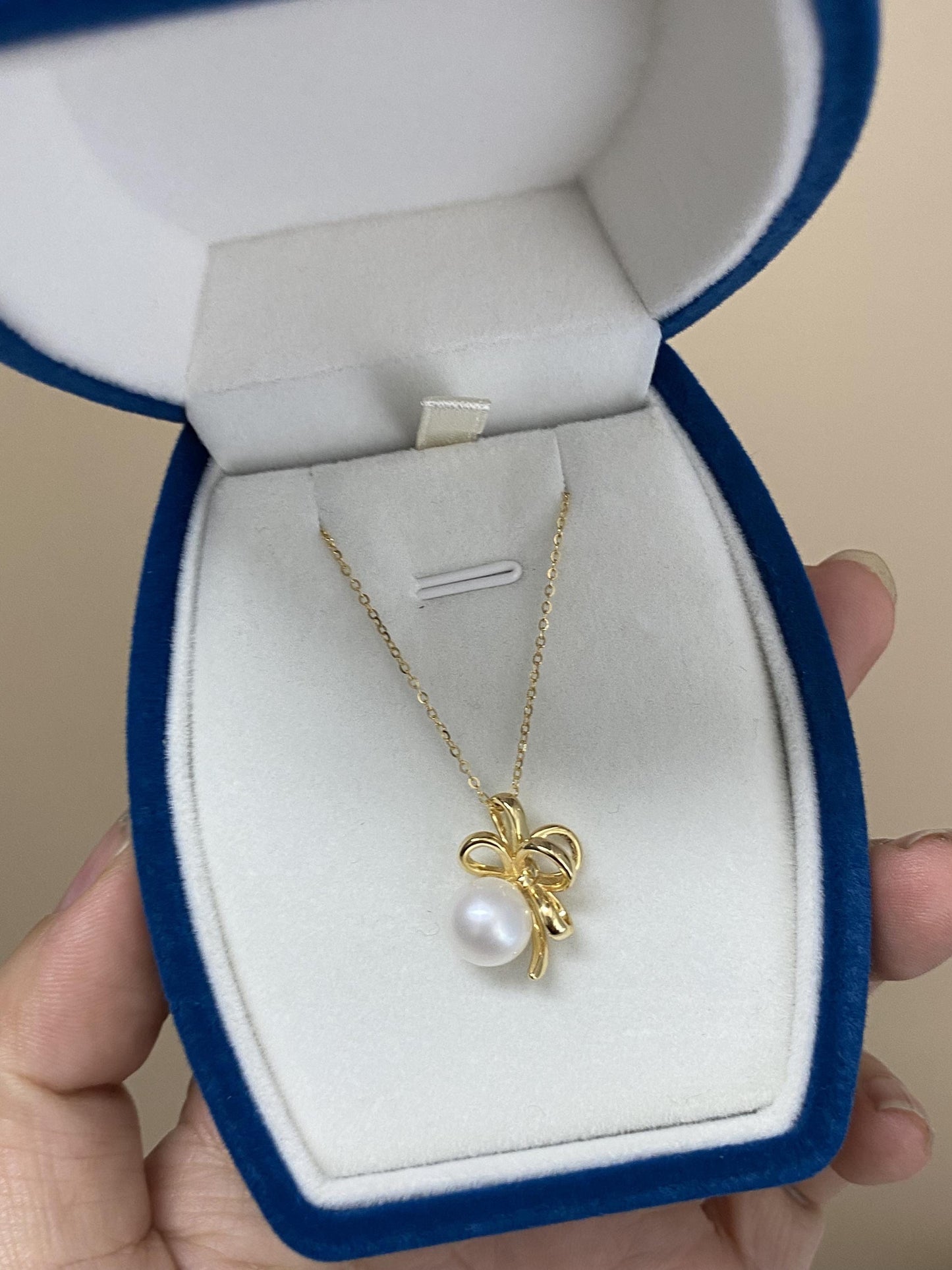 Sterling Silver Pearl Bow Necklace