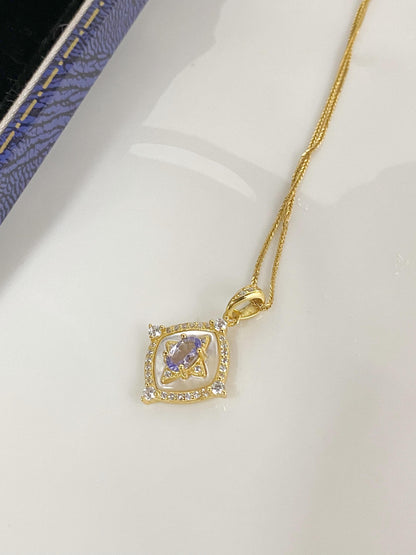 Tanzanite Pendant Necklace with Zircon Halo