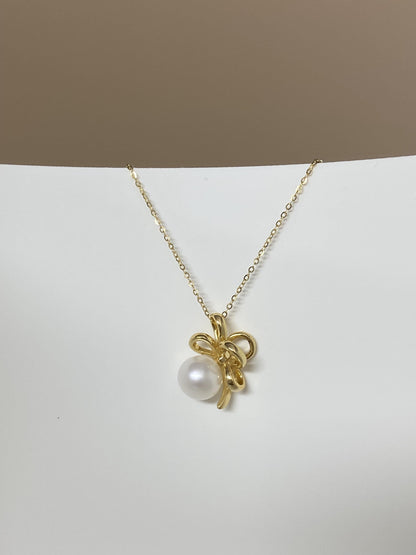 Sterling Silver Pearl Bow Necklace