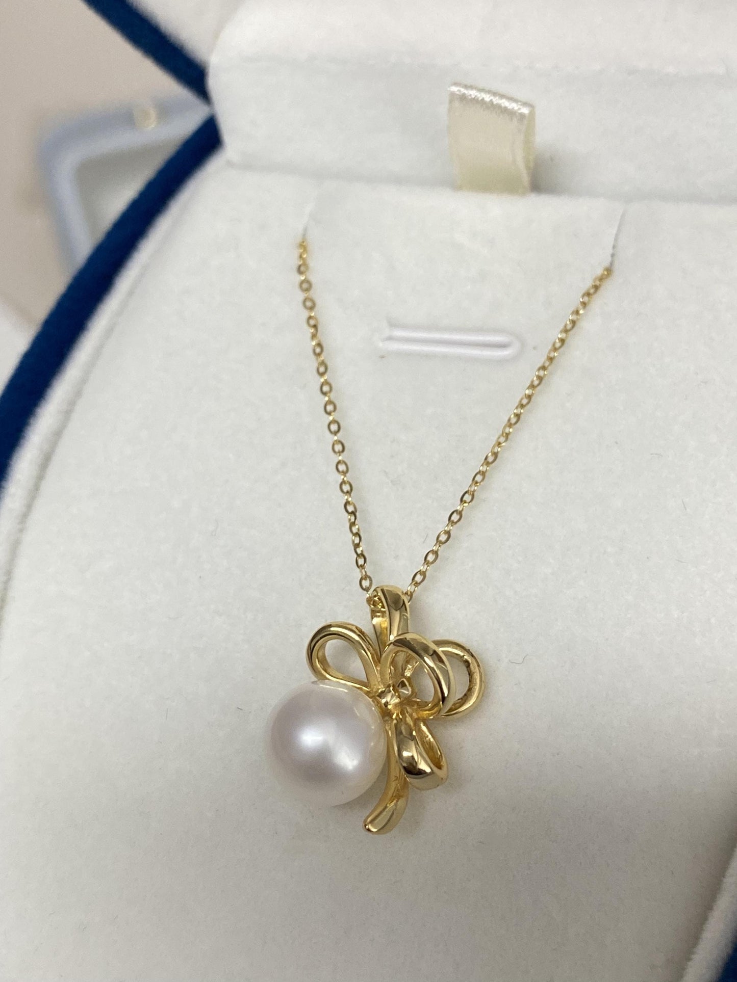 Sterling Silver Pearl Bow Necklace