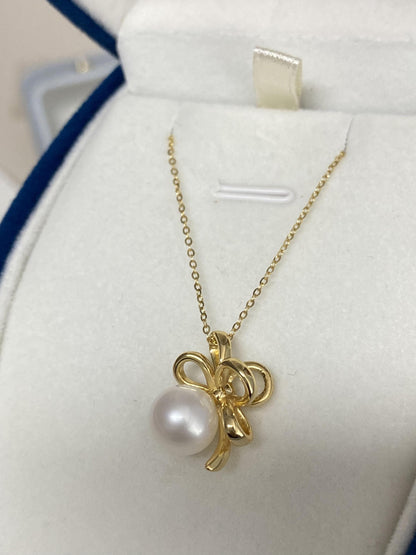 Sterling Silver Pearl Bow Necklace