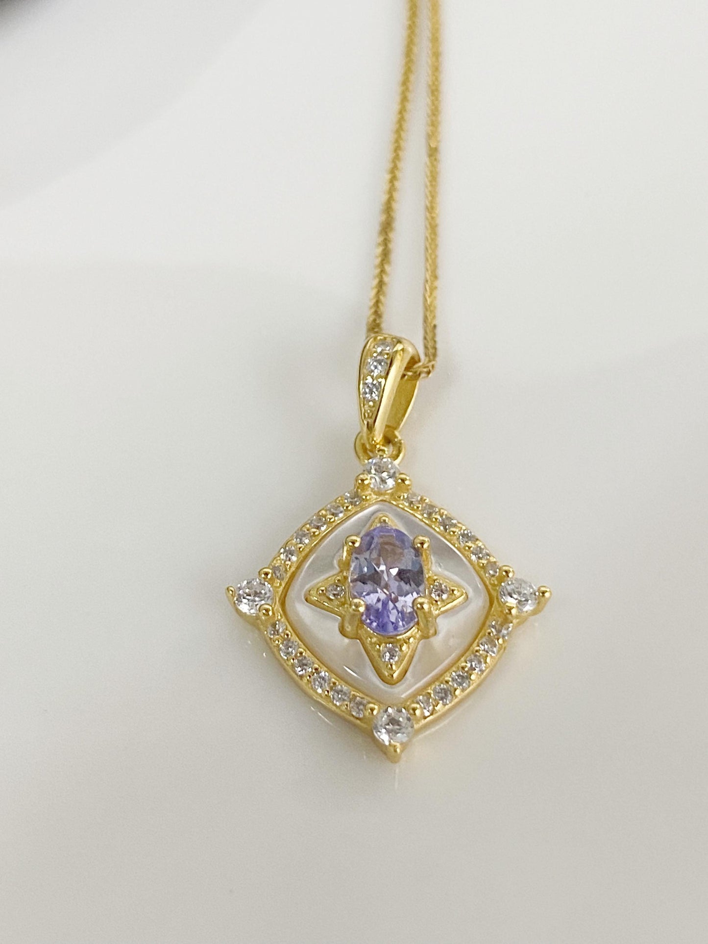 Tanzanite Pendant Necklace with Zircon Halo