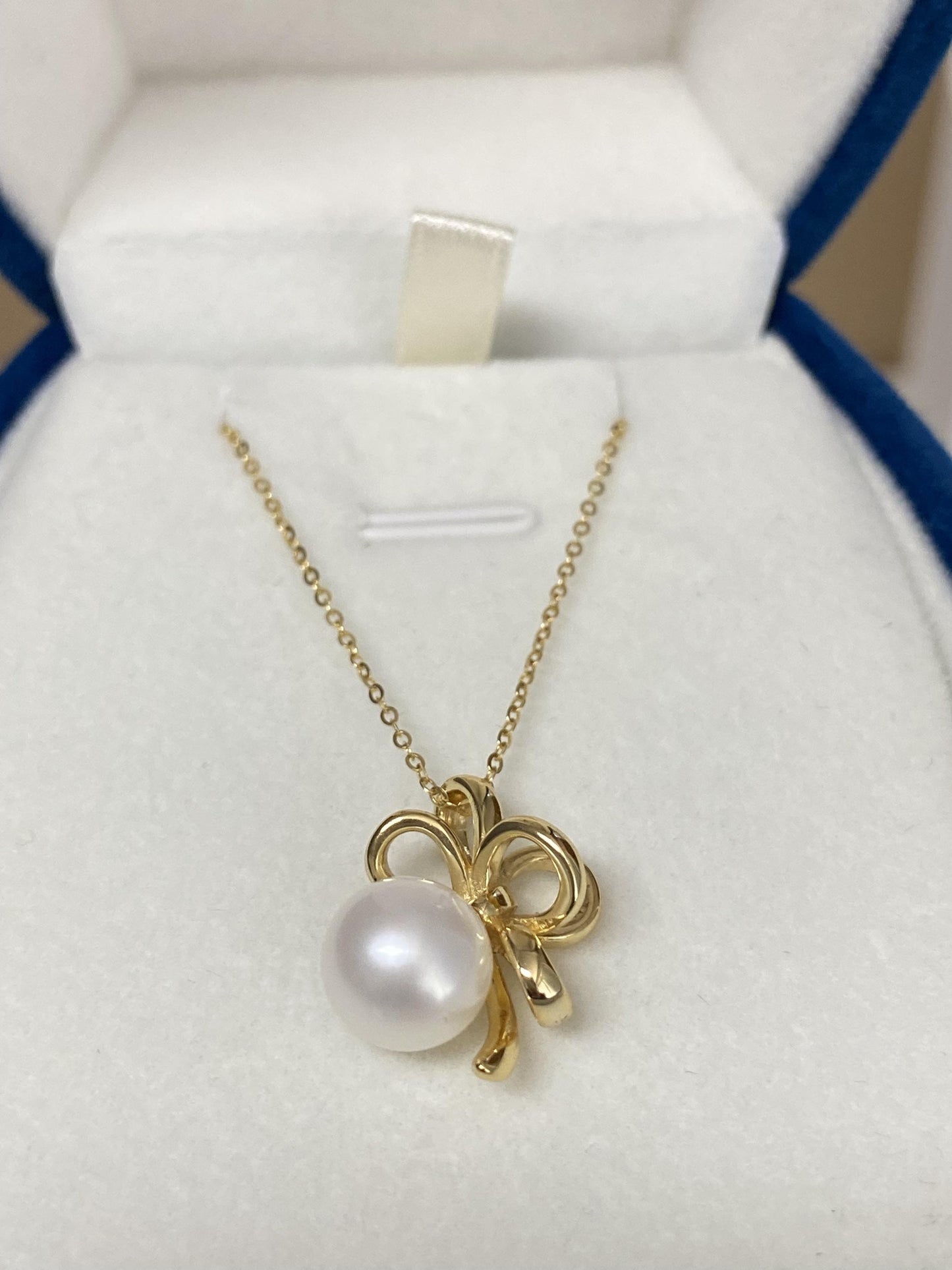 Sterling Silver Pearl Bow Necklace